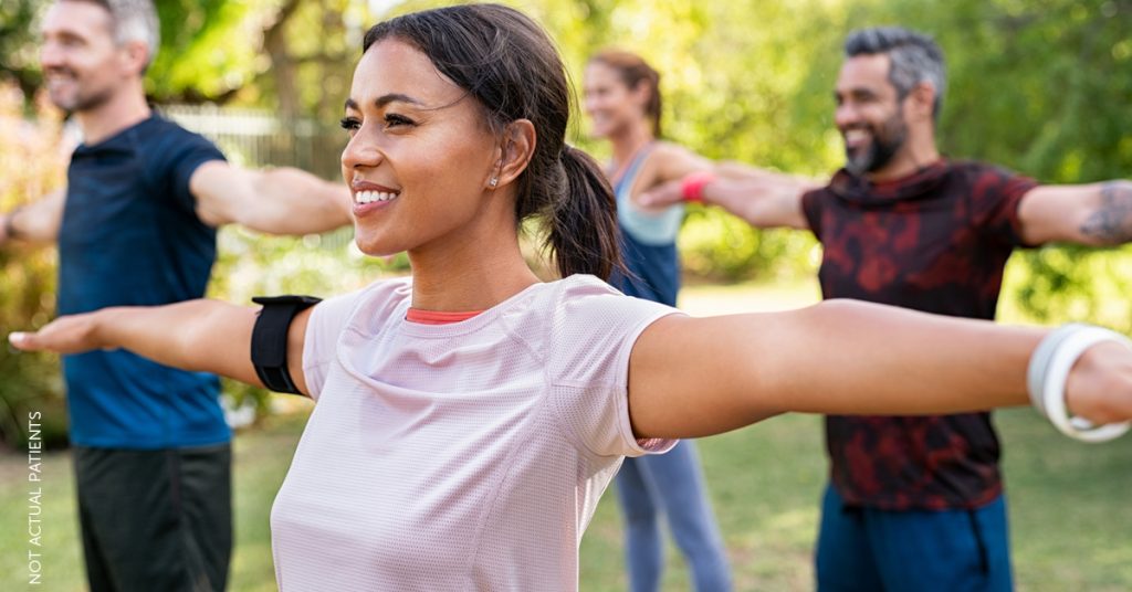 woman working out in the park sweating (MODEL)